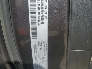 2021 Chrysler Pacifica Hybrid Touring L with VIN 2C4RC1L76MR526898, listed as a Copart auction lot 48133815 with 73,274 mi miles and Salvage title. Bid and sale history available at DreamBid. Image 13.
