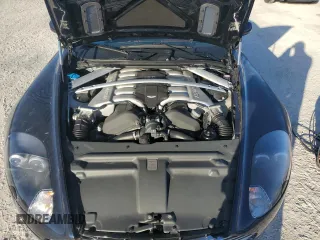 2006 Aston Martin DB9 z VIN SCFAB02A96GB04608, wystawiony jako Copart lot #76550654 z przebiegiem Nie podano mil oraz Nie do naprawy. Historia ofert i sprzedaży dostępna na DreamBid. Obrazek 11.