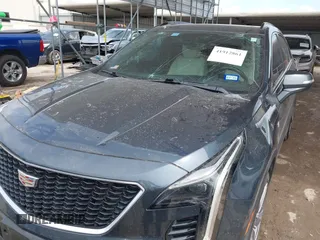 2019 Cadillac XT4 FWD Sport z VIN 1GYFZER49KF215843, wystawiony jako IAAI lot #41912861 z przebiegiem 102 922 mil mil oraz . Historia ofert i sprzedaży dostępna na DreamBid. Obrazek 6.