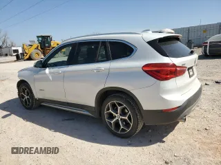 2018 BMW X1 sDrive28i with VIN WBXHU7C34J5H42983, listed as a Copart auction lot 49163645 with 73,508 mi miles and Salvage Title. Bid and sale history available at carsss.com. Image 2.