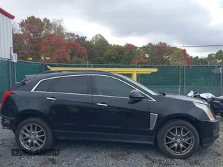 2015 Cadillac SRX z VIN 3GYFNAE30FS515953, wystawiony jako IAAI lot #40562508 z przebiegiem 163 112 mil mil oraz . Historia ofert i sprzedaży dostępna na DreamBid. Obrazek 14.