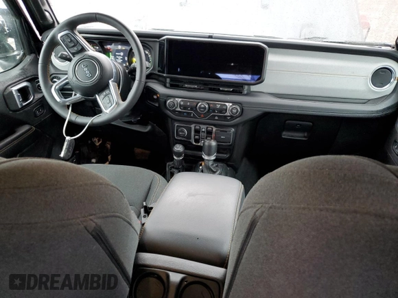 2024 Jeep Wrangler Sahara with VIN 1C4RJXP60RW257385, listed as a Copart auction lot 62984525 with 20,899 mi miles and Salvage title. Bid and sale history available at DreamBid. Image 8.