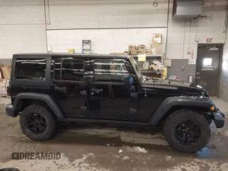 2016 Jeep Wrangler Unlimited Sport with VIN 1C4BJWDG9GL114359, listed as a IAAI auction lot 41422535 with 133,462 mi miles and . Bid and sale history available at DreamBid. Image 14.