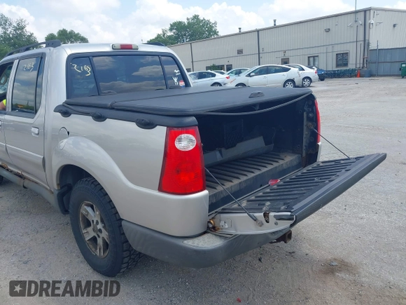 2005 Ford Explorer Sport Trac XLS z VIN 1FMZU77K15UB67801, wystawiony jako IAAI lot #42822163 z przebiegiem 179 102 mil mil oraz . Historia ofert i sprzedaży dostępna na DreamBid. Obrazek 13.