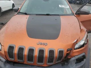 2014 Jeep Cherokee Trailhawk with VIN 1C4PJMBB4EW317799, listed as a Copart auction lot 46779095 with 95,832 mi miles and Clean Title. Bid and sale history available at carsss.com. Image 12.