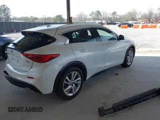 2017 Infiniti QX30 with VIN SJKCH5CP5HA028956, listed as a IAAI auction lot 41833632 with 110,142 mi miles and . Bid and sale history available at DreamBid. Image 4.