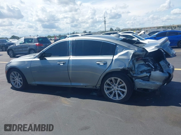 2023 Cadillac CT5 Luxury z VIN 1G6DW5RK3P0106764, wystawiony jako IAAI lot #42491584 z przebiegiem 32 223 mil mil oraz . Historia ofert i sprzedaży dostępna na DreamBid. Obrazek 14.