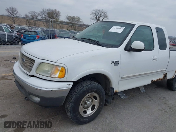 2003 Ford F-150 XL with VIN 1FTRX18L73NB72735, listed as a IAAI auction lot 42016567 with 0 mi miles. Bid and sale history available at carsss.com. Image 13.