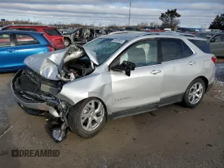 2021 Chevrolet Equinox Premier z VIN 3GNAXXEV5MS176237, wystawiony jako Copart lot #83689924 z przebiegiem 30 731 mil mil oraz Szkoda całkowita • Salvage title. Historia ofert i sprzedaży dostępna na DreamBid. Obrazek 1.