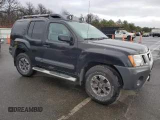 2014 Nissan Xterra X with VIN 5N1AN0NW5EN815643, listed as a Copart auction lot 85413894 with 43,413 mi miles and Salvage Title. Bid and sale history available at DreamBid. Image 4.
