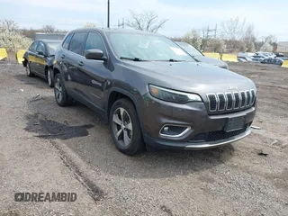 2019 Jeep Cherokee Limited with VIN 1C4PJMDX6KD156310, listed as a IAAI auction lot 41982999 with 52,000 mi miles. Bid and sale history available at carsss.com. Image 1.