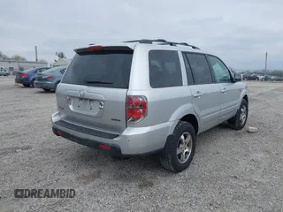 2007 Honda Pilot EX with VIN 5FNYF18457B009707, listed as a IAAI auction lot 42030214 with 229,462 mi miles. Bid and sale history available at carsss.com. Image 4.