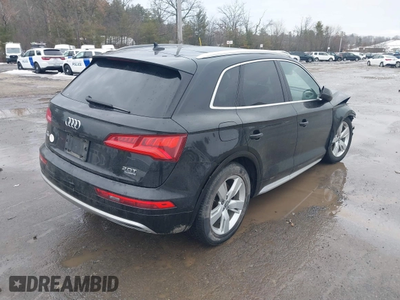 2018 Audi Q5 Premium Plus z VIN WA1BNAFY2J2151497, wystawiony jako IAAI lot #41688418 z przebiegiem 78 345 mil mil oraz . Historia ofert i sprzedaży dostępna na DreamBid. Obrazek 4.