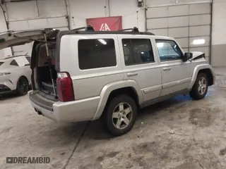 2010 Jeep Commander Sport with VIN 1J4RG4GK3AC118099, listed as a IAAI auction lot 41363371 with 195,824 mi miles. Bid and sale history available at carsss.com. Image 4.