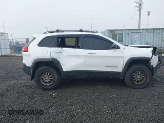 2017 Jeep Cherokee Trailhawk L Plus with VIN 1C4PJMBS2HD225011, listed as a IAAI auction lot 40802716 with 73,714 mi miles. Bid and sale history available at carsss.com. Image 13.