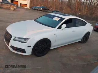 2014 Audi S7 Prestige with VIN WAUW2AFC1EN039425, listed as a IAAI auction lot 41803621 with 73,819 mi miles. Bid and sale history available at carsss.com. Image 2.