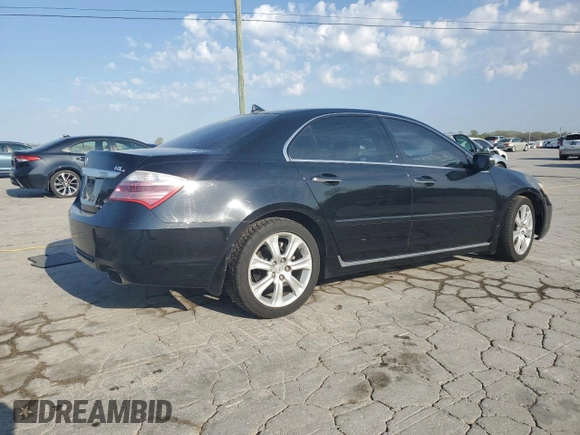 2009 Acura RL Tech Pkg with VIN JH4KB266X9C001760, listed as a Copart auction lot 52303615 with 232,253 mi miles and Salvage Title. Bid and sale history available at carsss.com. Image 3.