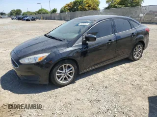 2018 Ford Focus SE with VIN 1FADP3FE0JL293485, listed as a Copart auction lot 61202625 with 91,025 mi miles and Salvage title. Bid and sale history available at DreamBid. Image 1.
