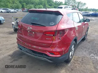 2018 Hyundai Santa Fe 2.4L with VIN 5XYZT3LB3JG541780, listed as a IAAI auction lot 42384065 with 96,754 mi miles and . Bid and sale history available at DreamBid. Image 17.