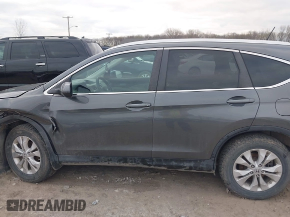 2013 Honda CR-V EX-L with VIN 2HKRM4H79DH664018, listed as a IAAI auction lot 41907086 with 196,150 mi miles. Bid and sale history available at carsss.com. Image 14.