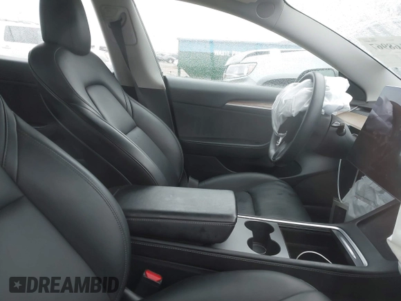 2022 Tesla Model 3 with VIN 5YJ3E1EA6NF186383, listed as a IAAI auction lot 41168967 with Not Provided miles and . Bid and sale history available at DreamBid. Image 5.