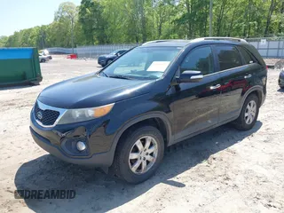 2011 Kia Sorento LX with VIN 5XYKT4A15BG183830, listed as a IAAI auction lot 42030175 with 210,713 mi miles. Bid and sale history available at carsss.com. Image 2.