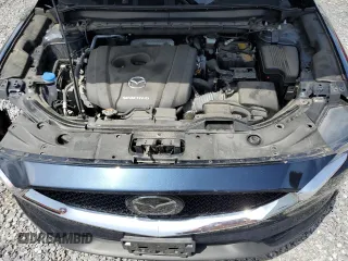 2021 Mazda CX-5 Touring with VIN JM3KFBCM0M0302015, listed as a Copart auction lot 55077305 with 40,558 mi miles and Salvage Title. Bid and sale history available at carsss.com. Image 12.