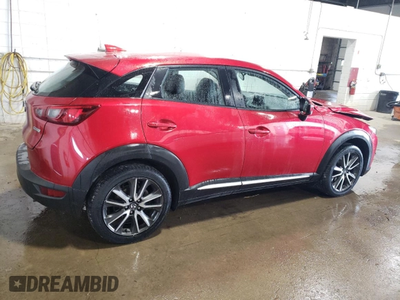 2017 Mazda CX-3 Grand Touring z VIN JM1DKFD70H0148182, wystawiony jako Copart lot #59032435 z przebiegiem 70 166 mil mil oraz Szkoda całkowita • Salvage title. Historia ofert i sprzedaży dostępna na DreamBid. Obrazek 3.