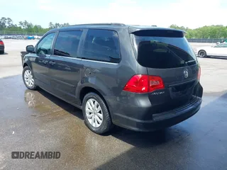 2012 Volkswagen Routan SE z VIN 2C4RVABG5CR127653, wystawiony jako IAAI lot #42090635 z przebiegiem 205 293 mil mil oraz . Historia ofert i sprzedaży dostępna na DreamBid. Obrazek 3.