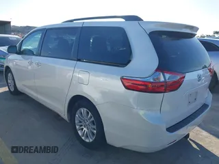 2016 Toyota Sienna XLE with VIN 5TDYK3DC6GS758189, listed as a IAAI auction lot 41598251 with 129,050 mi miles and . Bid and sale history available at DreamBid. Image 3.