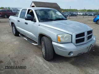 2006 Dodge Dakota SLT z VIN 1D7HW48N76S645515, wystawiony jako IAAI lot #42091904 z przebiegiem 160 695 mil mil oraz . Historia ofert i sprzedaży dostępna na DreamBid. Obrazek 1.