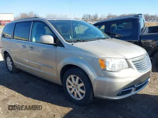 2014 Chrysler Town & Country Touring with VIN 2C4RC1BG2ER224267, listed as a IAAI auction lot 41750220 with 209,377 mi miles. Bid and sale history available at carsss.com. Image 1.