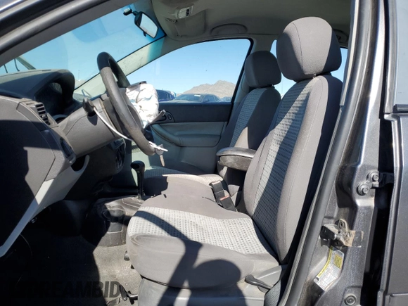 2007 Ford Focus S z VIN 1FAFP34NX7W321313, wystawiony jako Copart lot #43158235 z przebiegiem 57 299 mil mil oraz Szkoda całkowita • Salvage title. Historia ofert i sprzedaży dostępna na DreamBid. Obrazek 7.