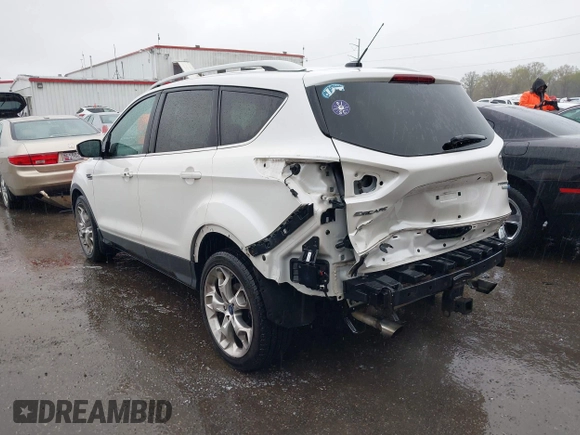 2014 Ford Escape Titanium with VIN 1FMCU9J94EUD49614, listed as a IAAI auction lot 42005864 with 87,779 mi miles. Bid and sale history available at carsss.com. Image 3.
