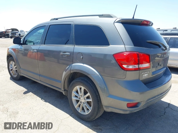 2013 Dodge Journey SXT with VIN 3C4PDCBB4DT563709, listed as a IAAI auction lot 42019033 with 201,188 mi miles. Bid and sale history available at carsss.com. Image 3.
