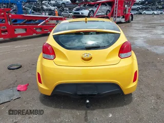 2012 Hyundai Veloster w/Black Int with VIN KMHTC6AD5CU046702, listed as a IAAI auction lot 42245379 with 136,327 mi miles and . Bid and sale history available at DreamBid. Image 16.
