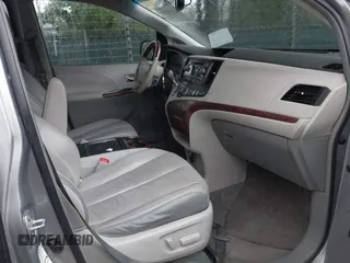 2011 Toyota Sienna XLE z VIN 5TDDK3DC1BS002387, wystawiony jako IAAI lot #42373126 z przebiegiem 279 026 mil mil oraz . Historia ofert i sprzedaży dostępna na DreamBid. Obrazek 5.