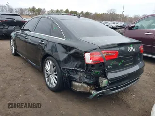 2015 Audi A6 Premium Plus z VIN WAUFGAFC6FN043800, wystawiony jako IAAI lot #41702164 z przebiegiem 122 267 mil mil oraz . Historia ofert i sprzedaży dostępna na DreamBid. Obrazek 3.