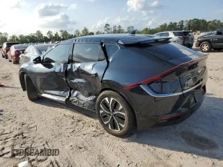2022 Kia EV6 Wind with VIN KNDC3DLC5N5072954, listed as a Copart auction lot 79964454 with 15,577 mi miles and Salvage Title. Bid and sale history available at carsss.com. Image 2.