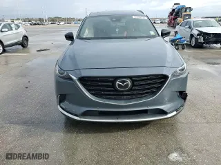 2021 Mazda CX-9 Grand Touring with VIN JM3TCADYXM0519757, listed as a Copart auction lot 86665134 with 51,217 mi miles and Salvage Title. Bid and sale history available at carsss.com. Image 12.