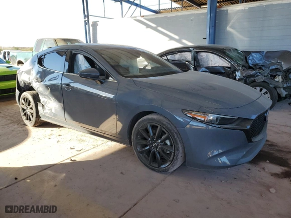 2019 Mazda Mazda3 Hatchback w/Premium Pkg with VIN JM1BPBNM9K1125071, listed as a Copart auction lot 86589954 with 63,157 mi miles and Salvage Title. Bid and sale history available at carsss.com. Image 4.