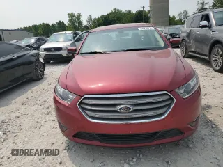 2015 Ford Taurus SEL z VIN 1FAHP2E88FG112446, wystawiony jako Copart lot #58920715 z przebiegiem 65 392 mil mil oraz Czysty tytuł • Clean title. Historia ofert i sprzedaży dostępna na DreamBid. Obrazek 5.