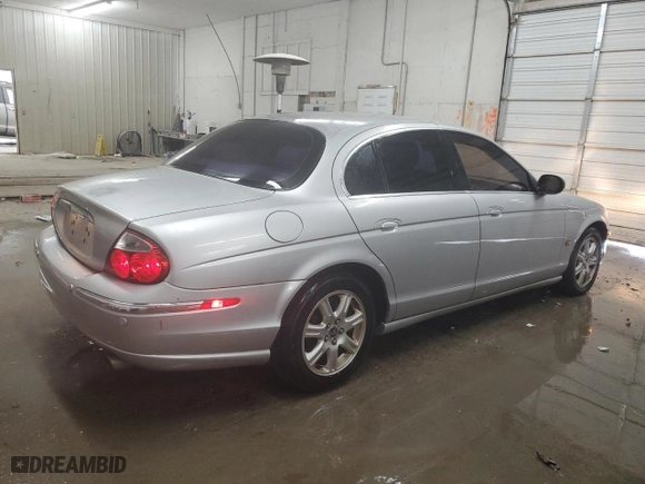 2004 Jaguar S-Type with VIN SAJEA01T74FN12824, listed as a Copart auction lot 82106064 with 0 mi miles and Salvage Title. Bid and sale history available at carsss.com. Image 3.