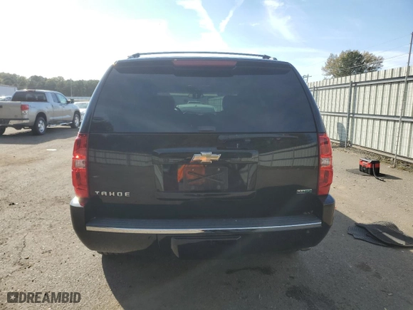 2010 Chevrolet Tahoe LTZ with VIN 1GNUCCE07AR207394, listed as a Copart auction lot 83867634 with 207,112 mi miles and Salvage Title. Bid and sale history available at carsss.com. Image 6.