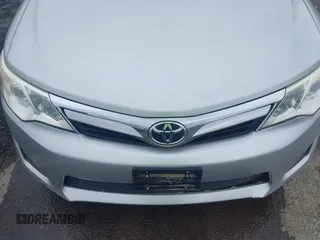2012 Toyota Camry L z VIN 4T4BF1FK0CR157600, wystawiony jako IAAI lot #42438078 z przebiegiem 94 310 mil mil oraz . Historia ofert i sprzedaży dostępna na DreamBid. Obrazek 6.