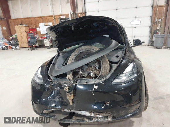 2022 Tesla Model Y Long Range z VIN 7SAYGDEE0NF342215, wystawiony jako IAAI lot #42136858 z przebiegiem 53 037 mil mil oraz . Historia ofert i sprzedaży dostępna na DreamBid. Obrazek 11.