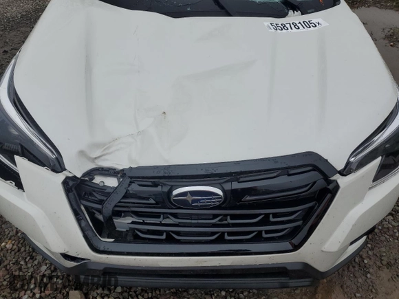 2024 Subaru Forester Premium z VIN JF2SKACC0RH497985, wystawiony jako Copart lot #55878105 z przebiegiem 11 503 mil mil oraz Szkoda całkowita • Salvage title. Historia ofert i sprzedaży dostępna na DreamBid. Obrazek 12.