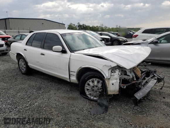 2003 Mercury Grand Marquis GS Convenience z VIN 2MEFM74WX3X633910, wystawiony jako Copart lot #52999865 z przebiegiem 207 970 mil mil oraz Szkoda całkowita • Salvage title. Historia ofert i sprzedaży dostępna na DreamBid. Obrazek 4.