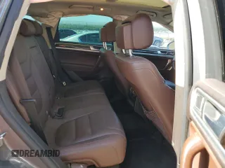 2013 Volkswagen Touareg Sport с VIN WVGEP9BP0DD010408, выставлен на аукционе Copart как лот 75854084 с пробегом 159 863 миль миль и Списание • Salvage title. История ставок и продаж доступна на DreamBid. Изображение 11.