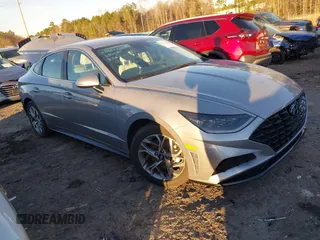 2023 Hyundai Sonata SEL z VIN KMHL64JA1PA321006, wystawiony jako IAAI lot #38313188 z przebiegiem 12 619 mil mil oraz . Historia ofert i sprzedaży dostępna na DreamBid. Obrazek 1.